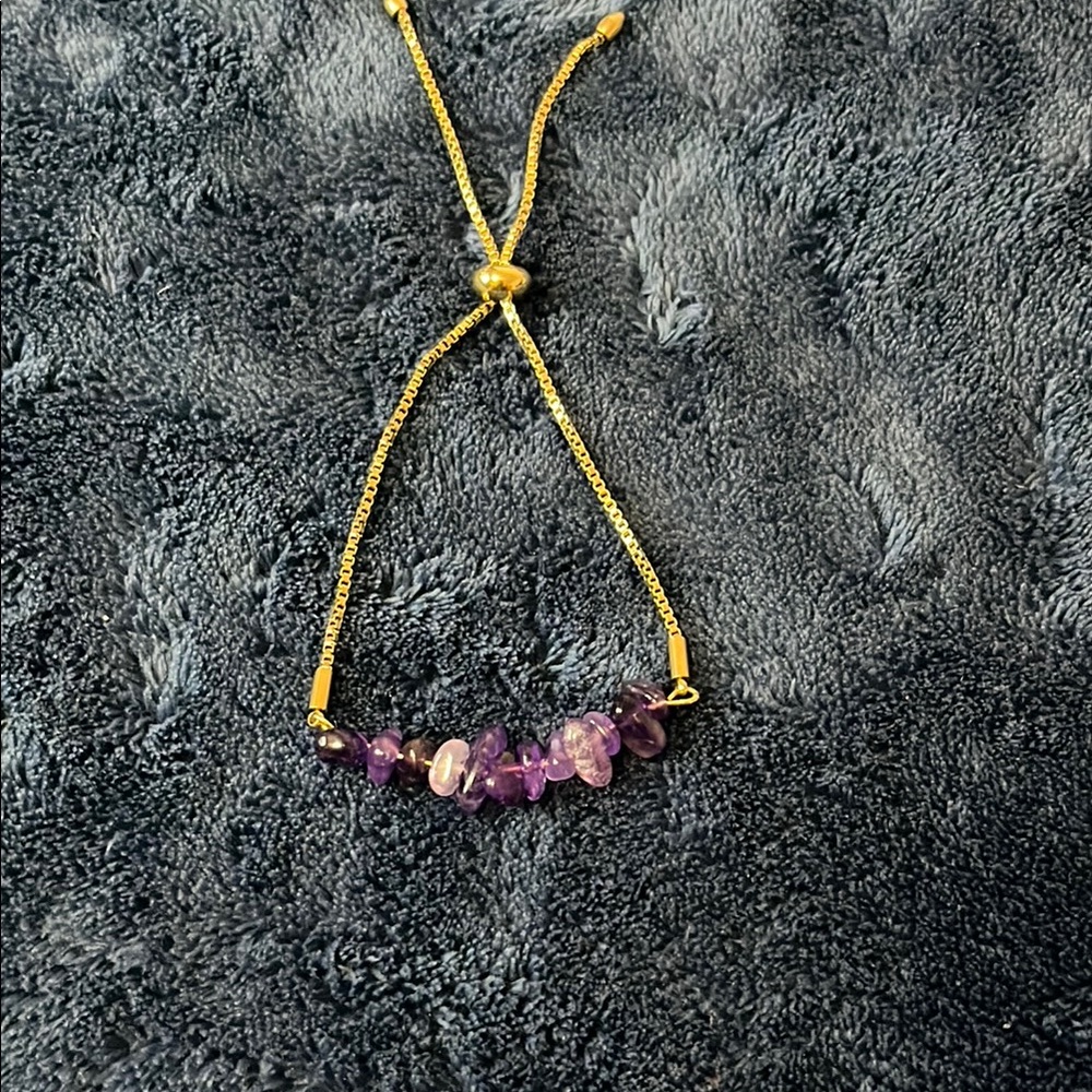 Elegant Gold and Purple Bracelet